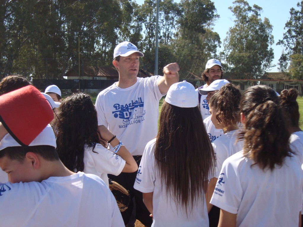 Baseball For All coach with youth players